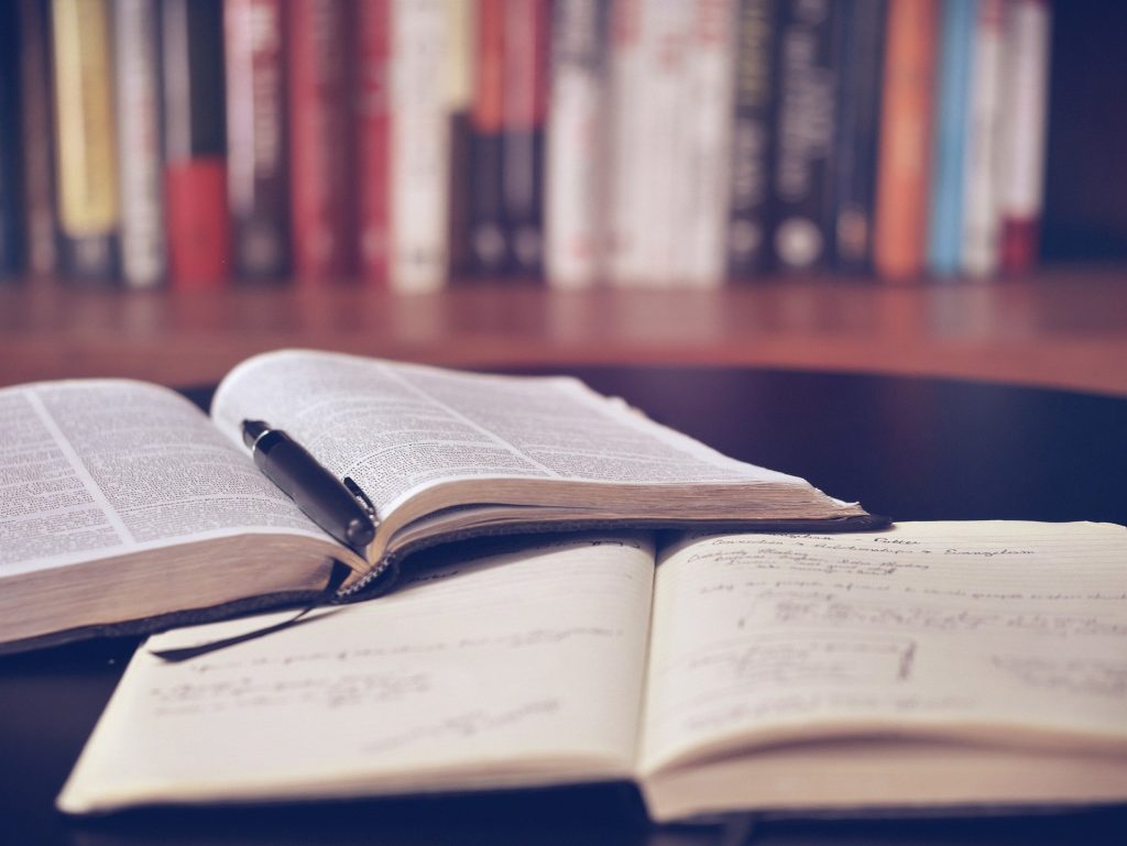 a book with updates and a notebook for noticing that